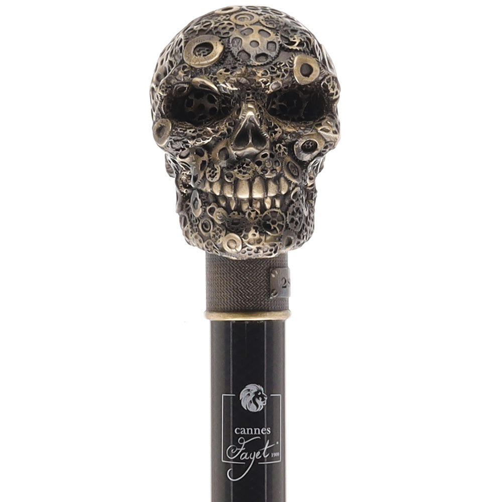 What is the skull made of? Does it un thread from shaft?